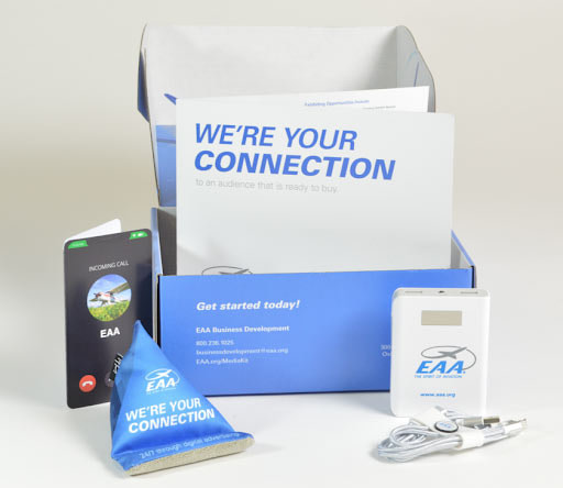Photo of the custom branded merchandise mailer kit for EAA.